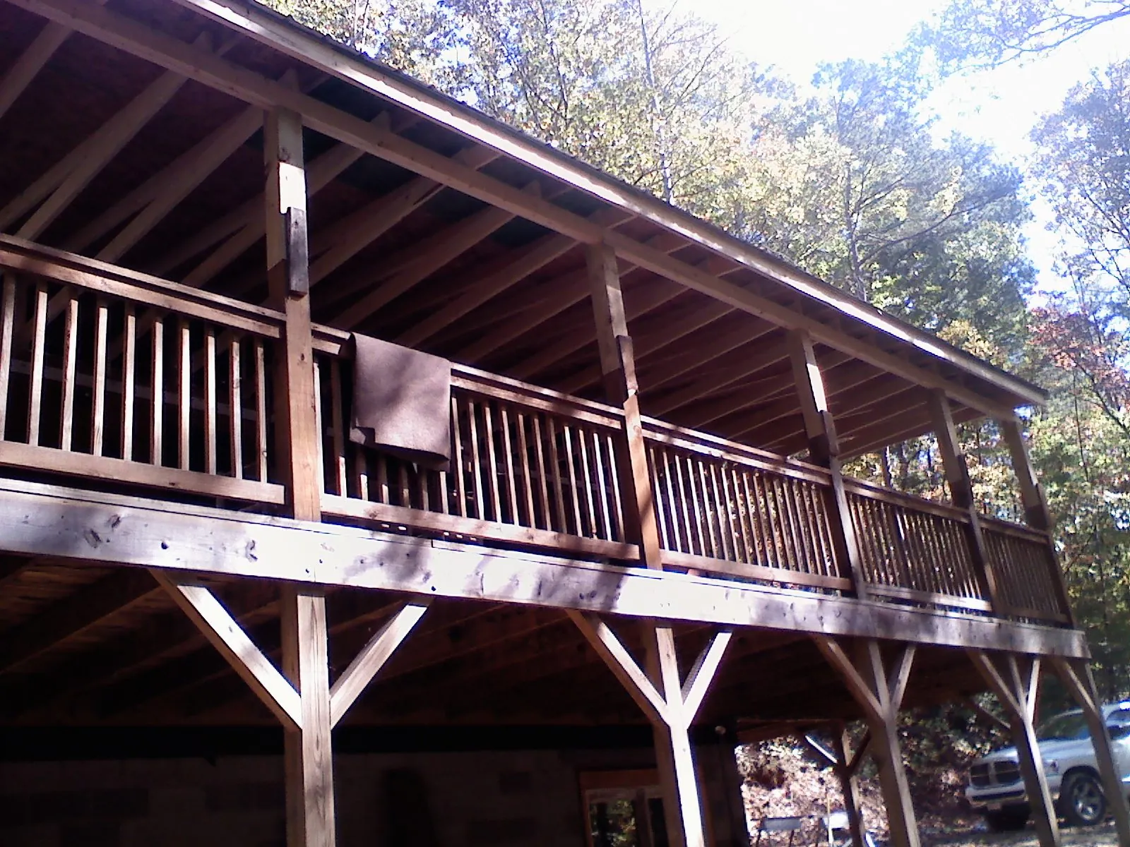 Timber framing under a new elevated porch and deck — Roof Leak Repair in Boxford by Roofing Brothers